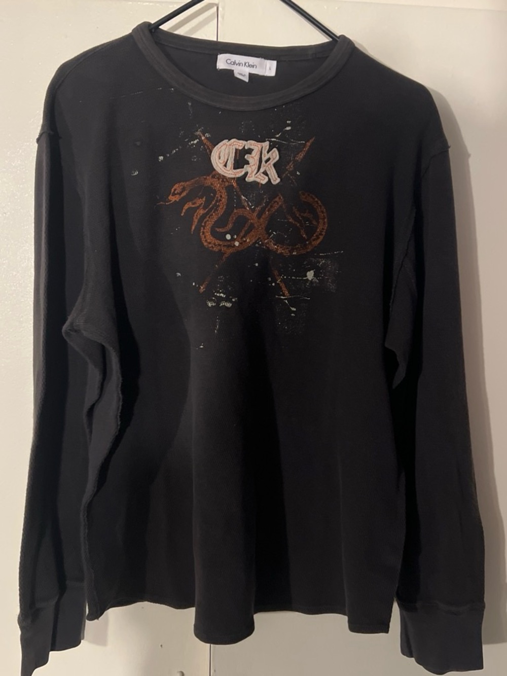 Calvin Klein Black Long Sleeve Tee with Rust Graphic